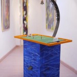 Spielinsel, 2014, Acryl auf Holz, Stahl, Glocke, Tipp-Kick, 56x94x180 cm